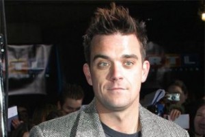 robbie-williams-se-inyecta-testosterona_323x216